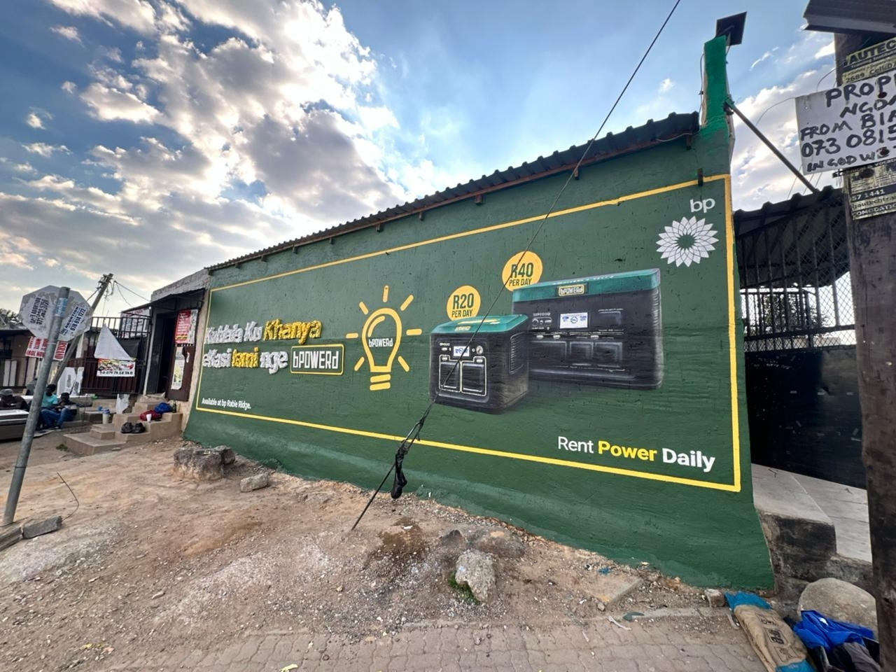 BP Powerd outdoor mural beside a taxi rank