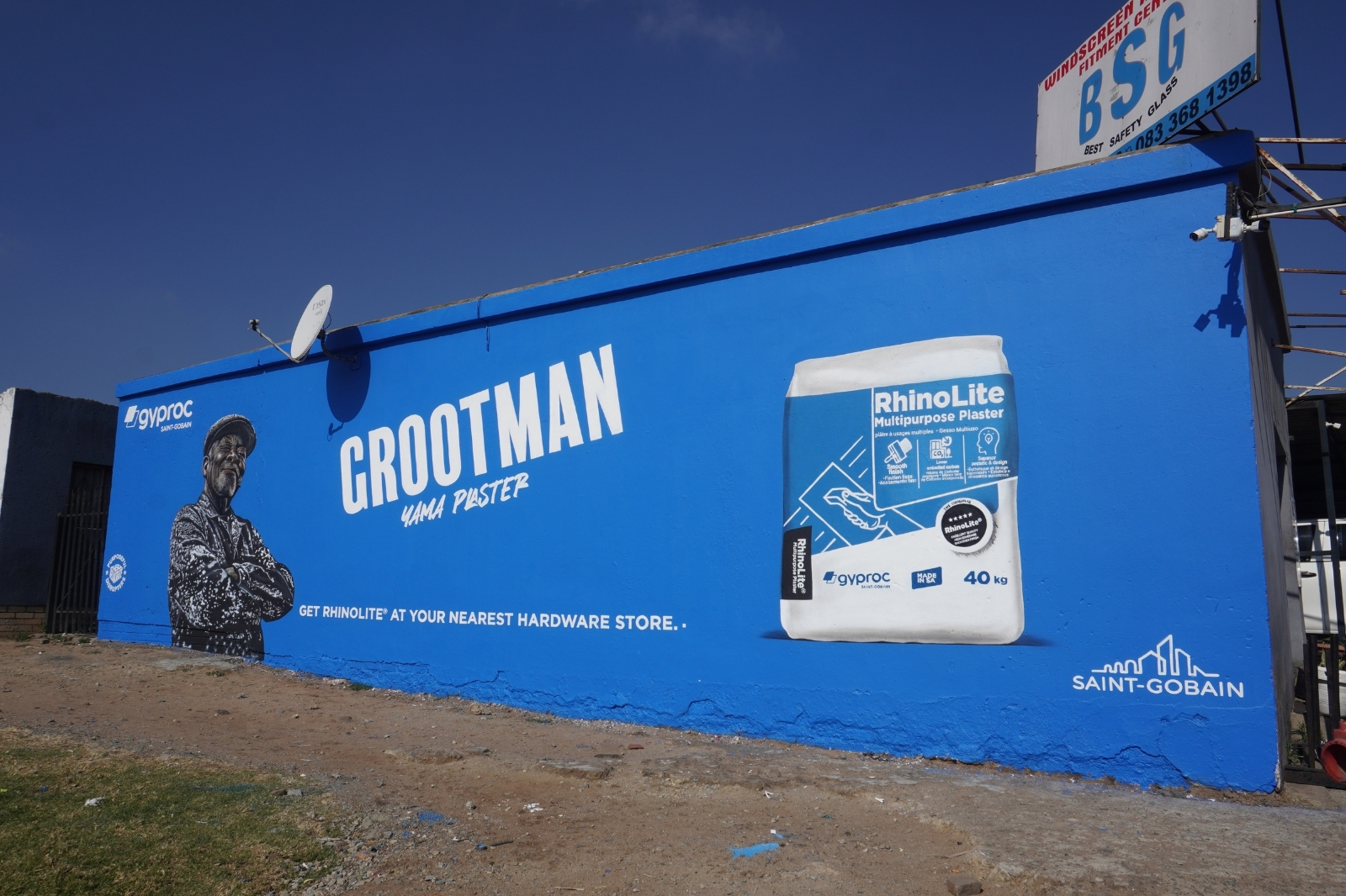 Gyproc Grootman blue mural on a community wall