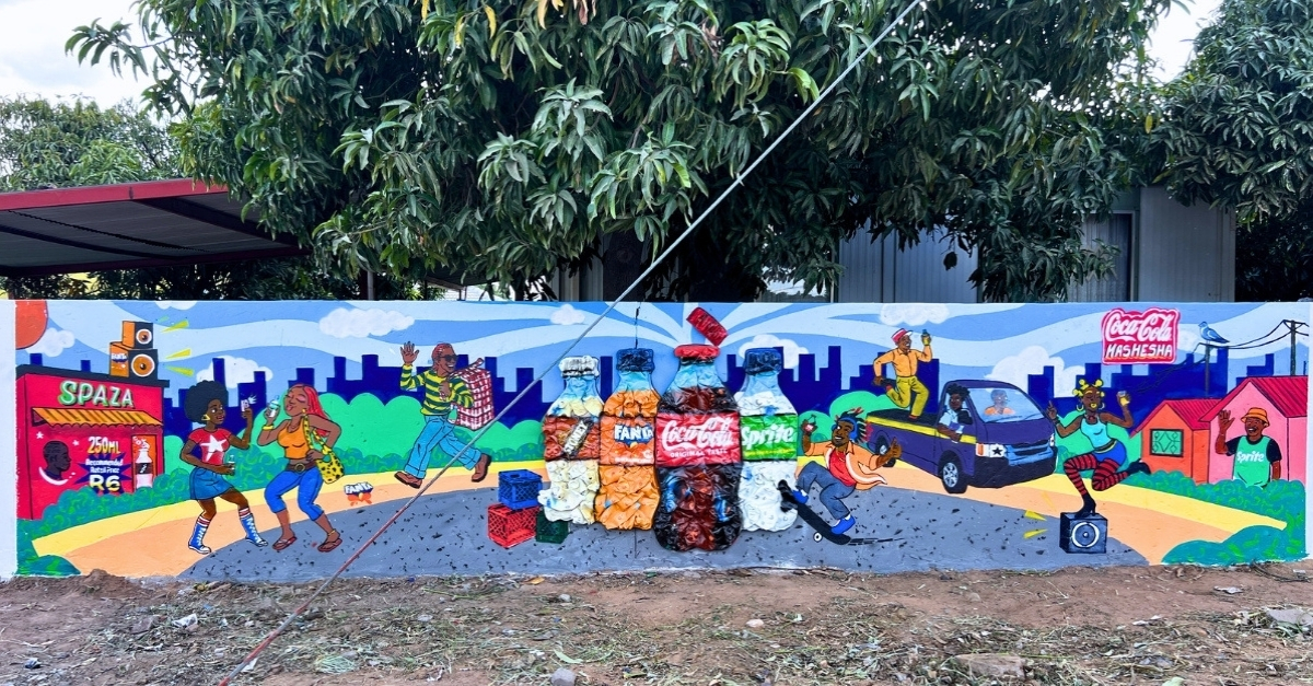 Coca-Cola and Fanta mural with 3D bottle elements