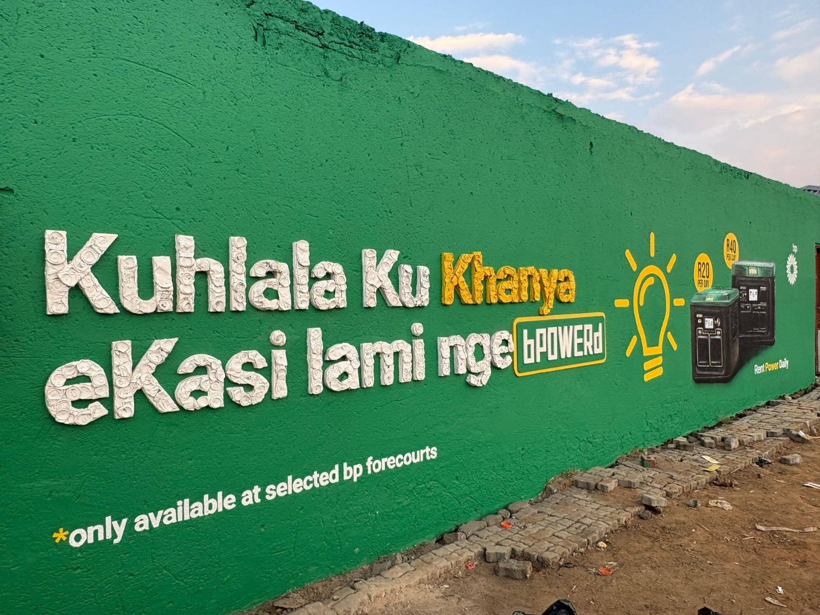 BP Powerd green mural with 3D lettering